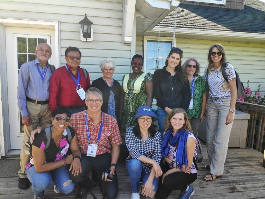 WHEAT-sponsored journalists stand for a group photo with farmer Merle Rugg (top row, third from left), in Elstow, Saskatchewan. (Photo: Amit Bhattacharya)