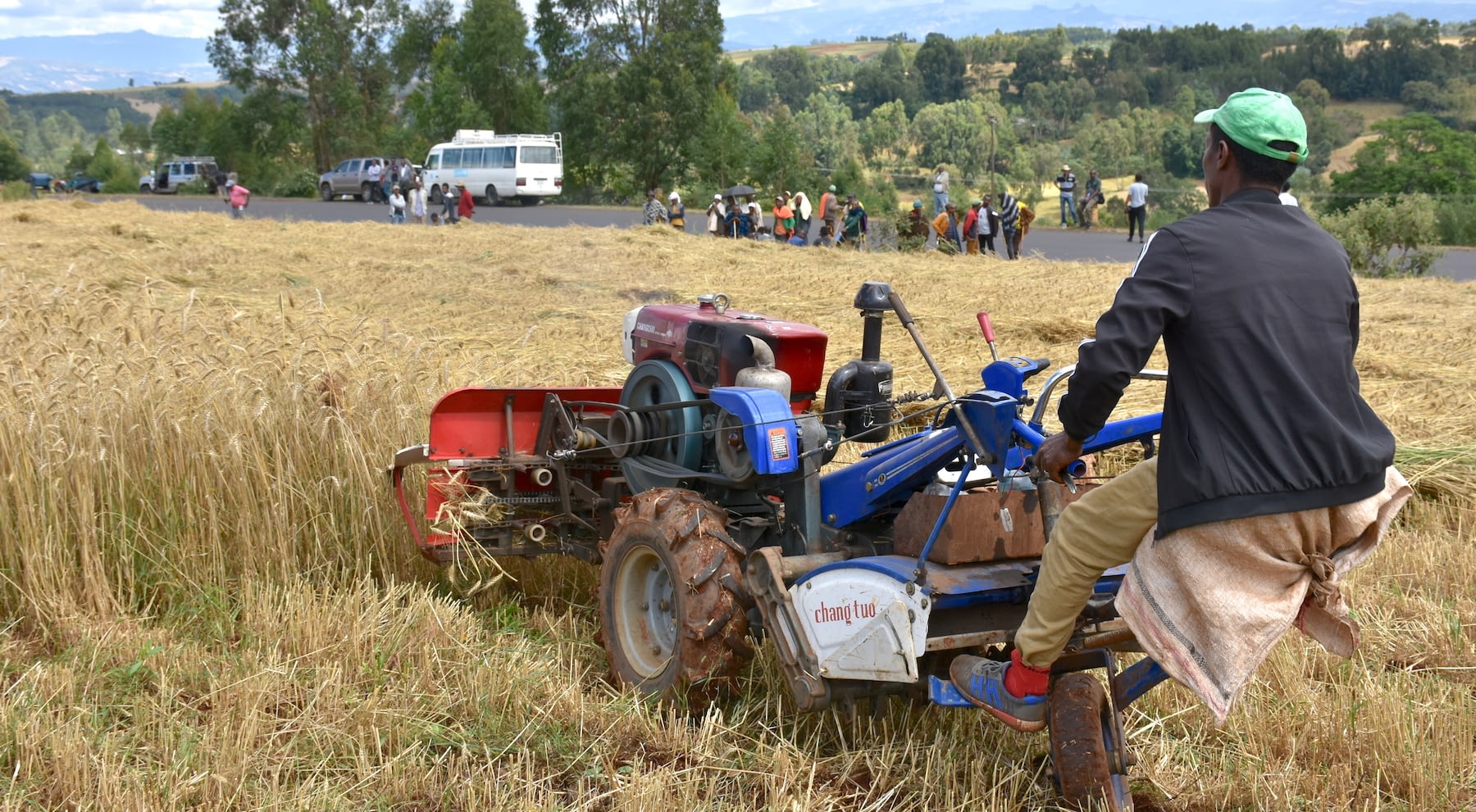 Farmers see a demonstration of how the two-wheel tractor functions. (Photo: Simret Yasabu/CIMMYT)