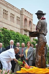 Flowers are placed at the statue of Dr. Norman Borlaug at the National Agricultural Science Complex in Delhi. Photo credit: M.Shindler/CIMMYT