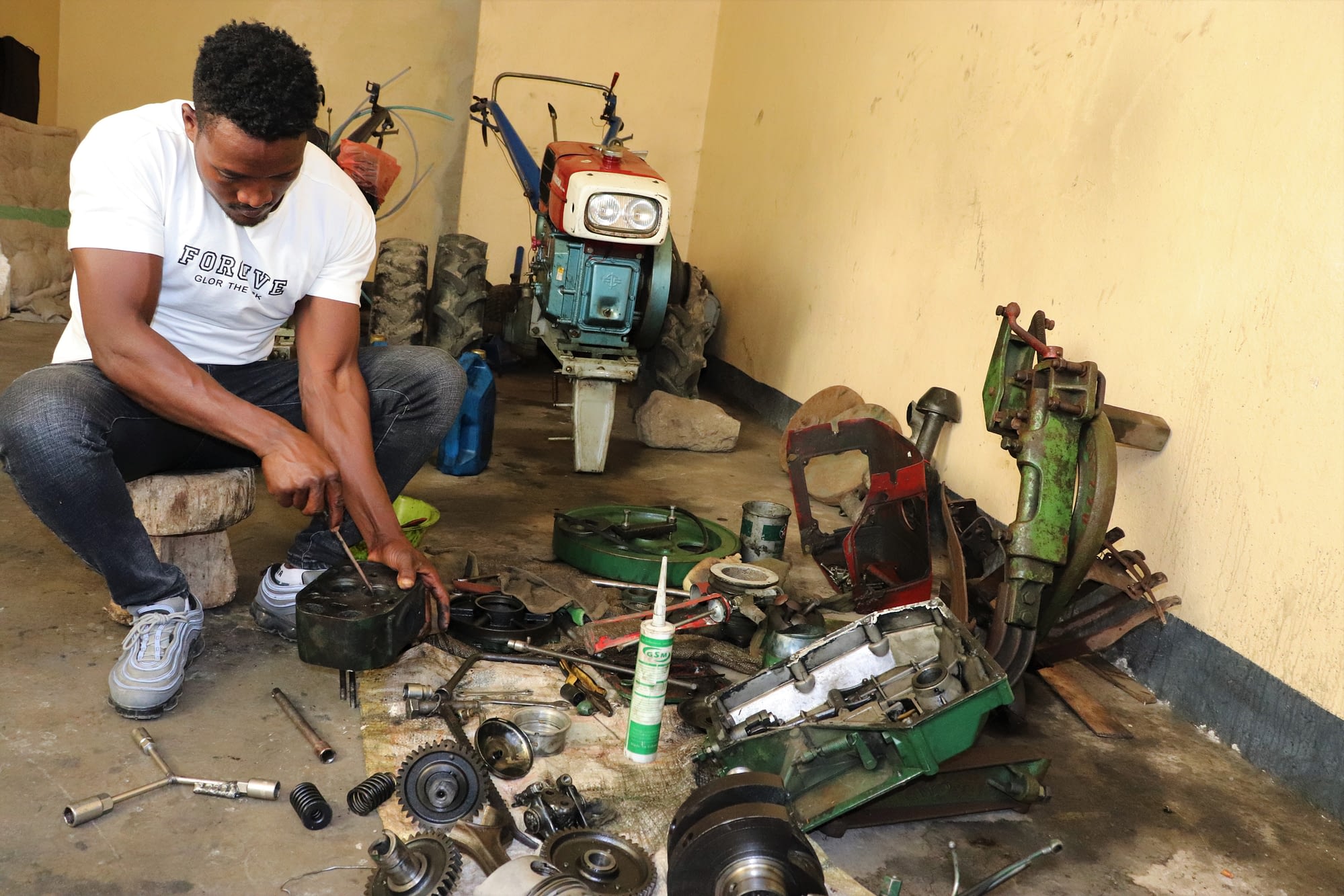 Beyene Chufamo (28) is a two-wheel tractor technology service provider based in Meki, Ethiopia. In 2016, with the support of CIMMYT, he started providing repair and maintenance services to service providers in different areas. (Photo: Ephrem Tadesse/CIMMYT)