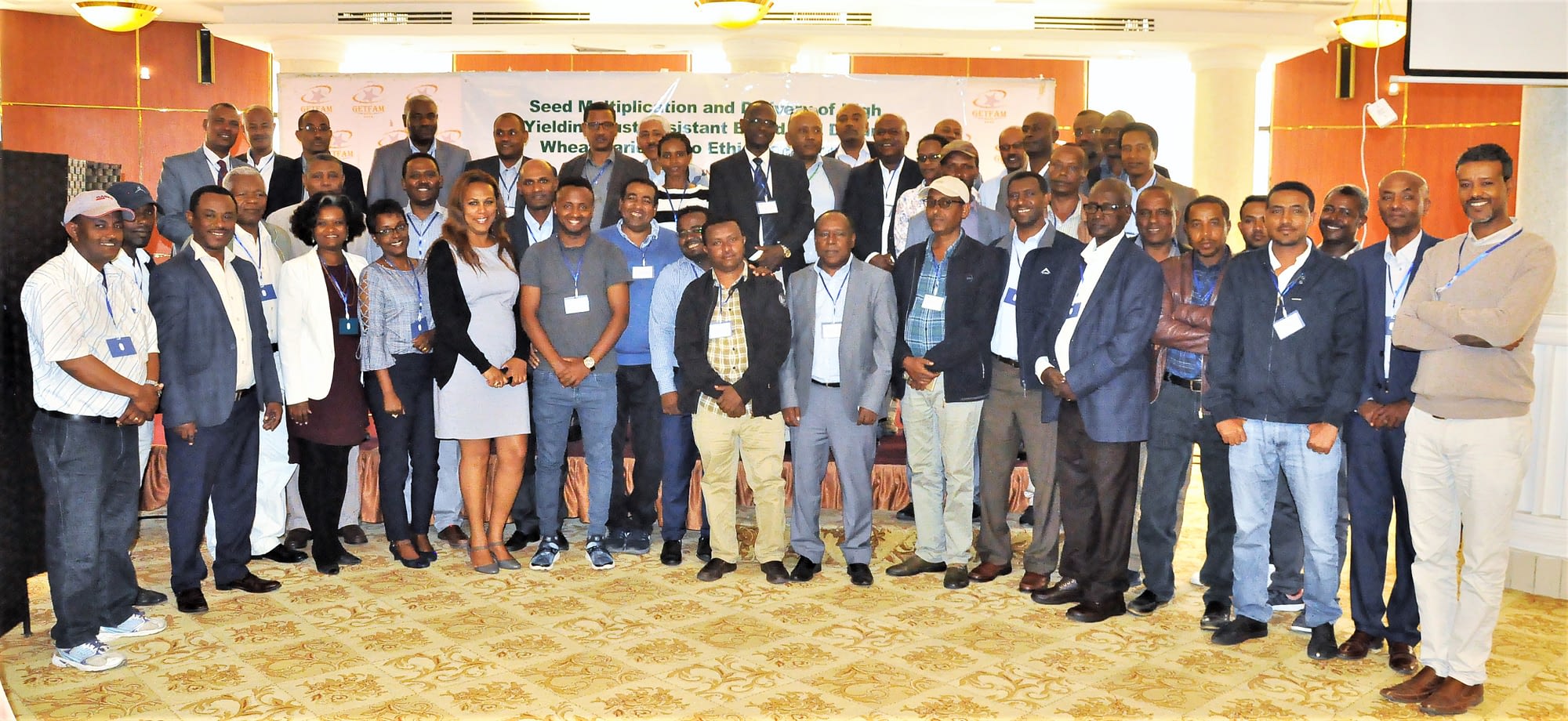 Participants of the project closure workshop stand for a group photo. (Photo: Semu Yemane/EIAR)