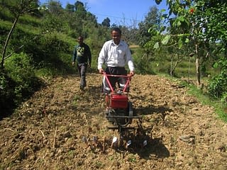 Farmer-uses-minitiller-in-Nepal