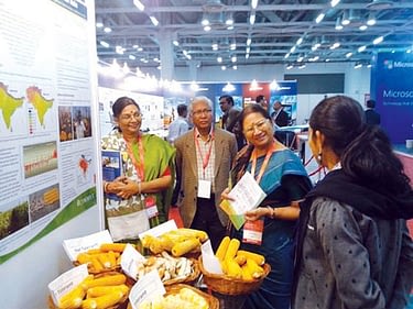 Ms. Kiranmayi T. explains HTMA products to Government of India officials. Photo: K. Seetharam/CIMMYT