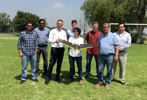 Learning about the use of UAV with CIMMYT scientists including (L-R) Francelino Rodrigues, Zia Ahmed, Martin Kropff, Lorena Gonzalez, Alex Park, Kai Sonder, Bruno Gérard and Juan Arista. (Photo: CIMMYT)