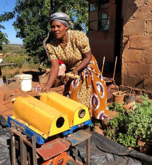 Clara Chikuni has gained a reliable income since becoming a mechanization service provider and offering maize shelling in her local area. (Photo: Matthew O’Leary/CIMMYT)