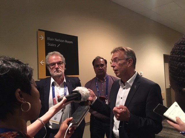 Martin Kropff (right), Director General of the International Maize and Wheat Improvement Center (CIMMYT), speaks to the press at the International Wheat Congress. (Photo: Marcia MacNeil/CIMMYT)