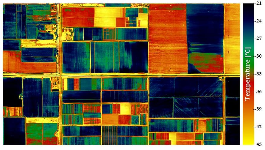 Innovations in measuring plant responses include remote sensing systems, such as multispectral and thermal cameras flown over breeding fields. In this image of the CIMMYT experimental station in Obregón, Mexico, water-stressed plots are shown in green and red. (Photo: CIMMYT and the Instituto de Agricultura Sostenible)